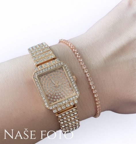 Luxusné dámske hodinky vysadené čírymi kameňmi vo rose gold farbe, s náramkom